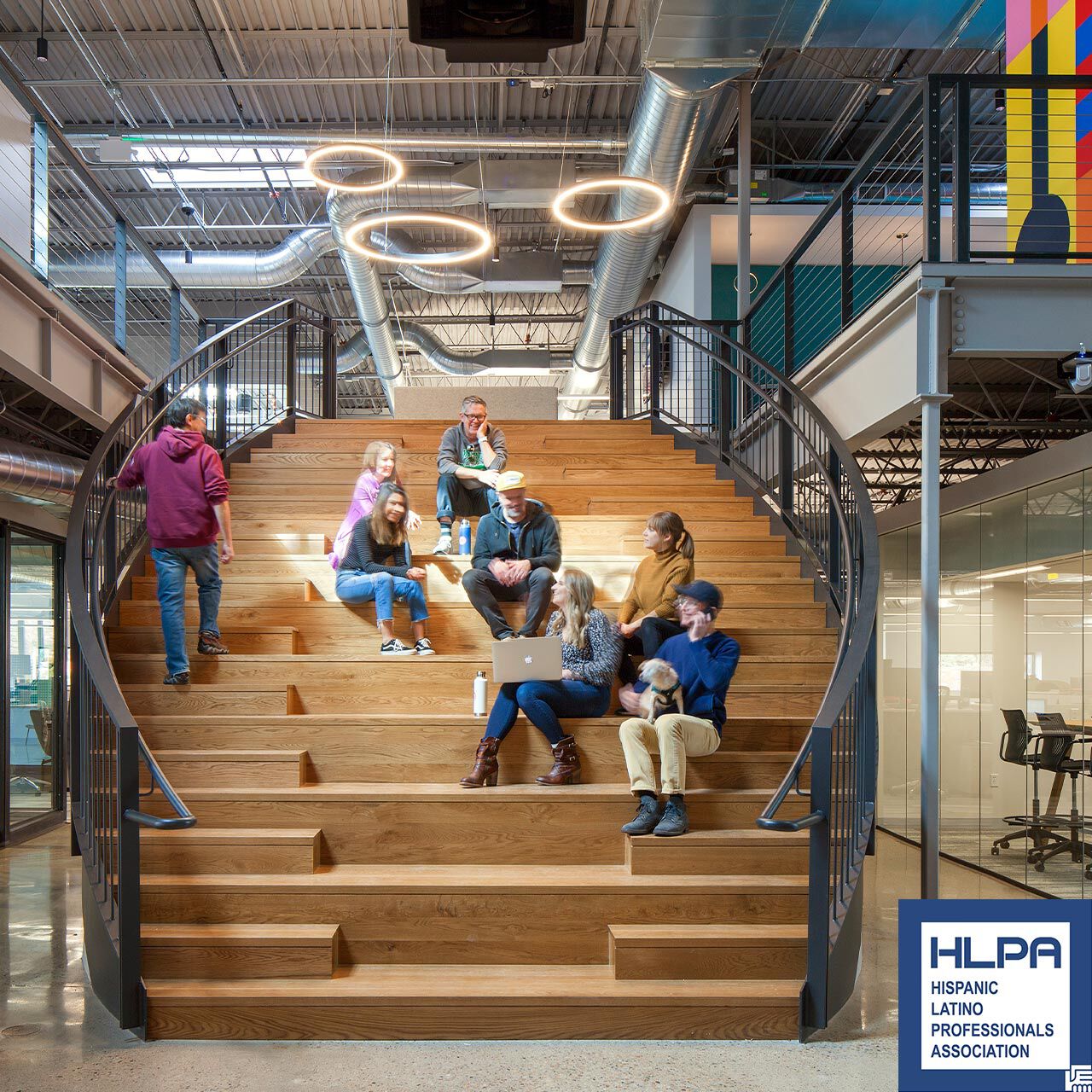 PopSockets employees sitting on office stairway